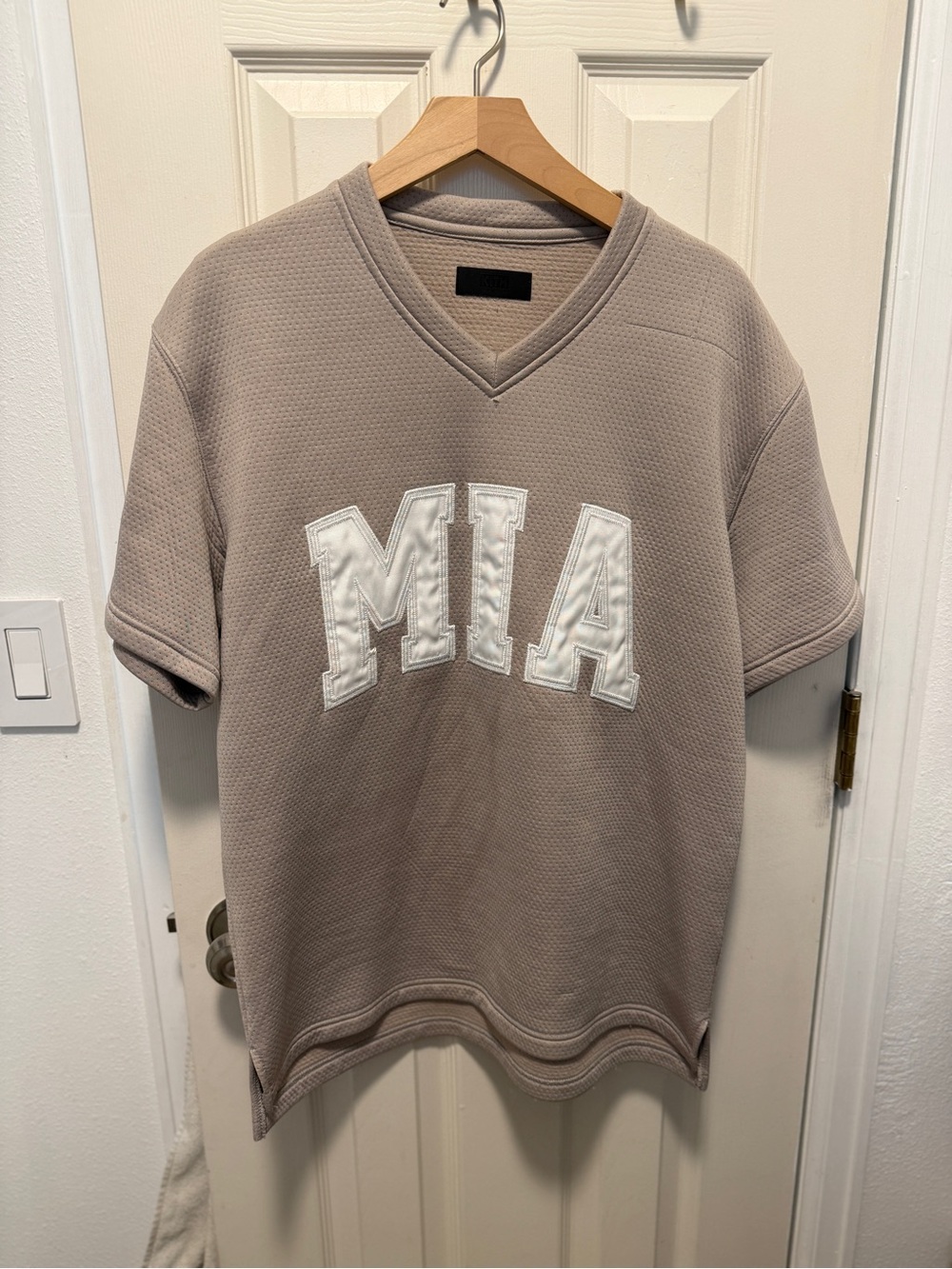 Kith Taupe Short-Sleeve V-Neck Sweater with White MIA Appliqué